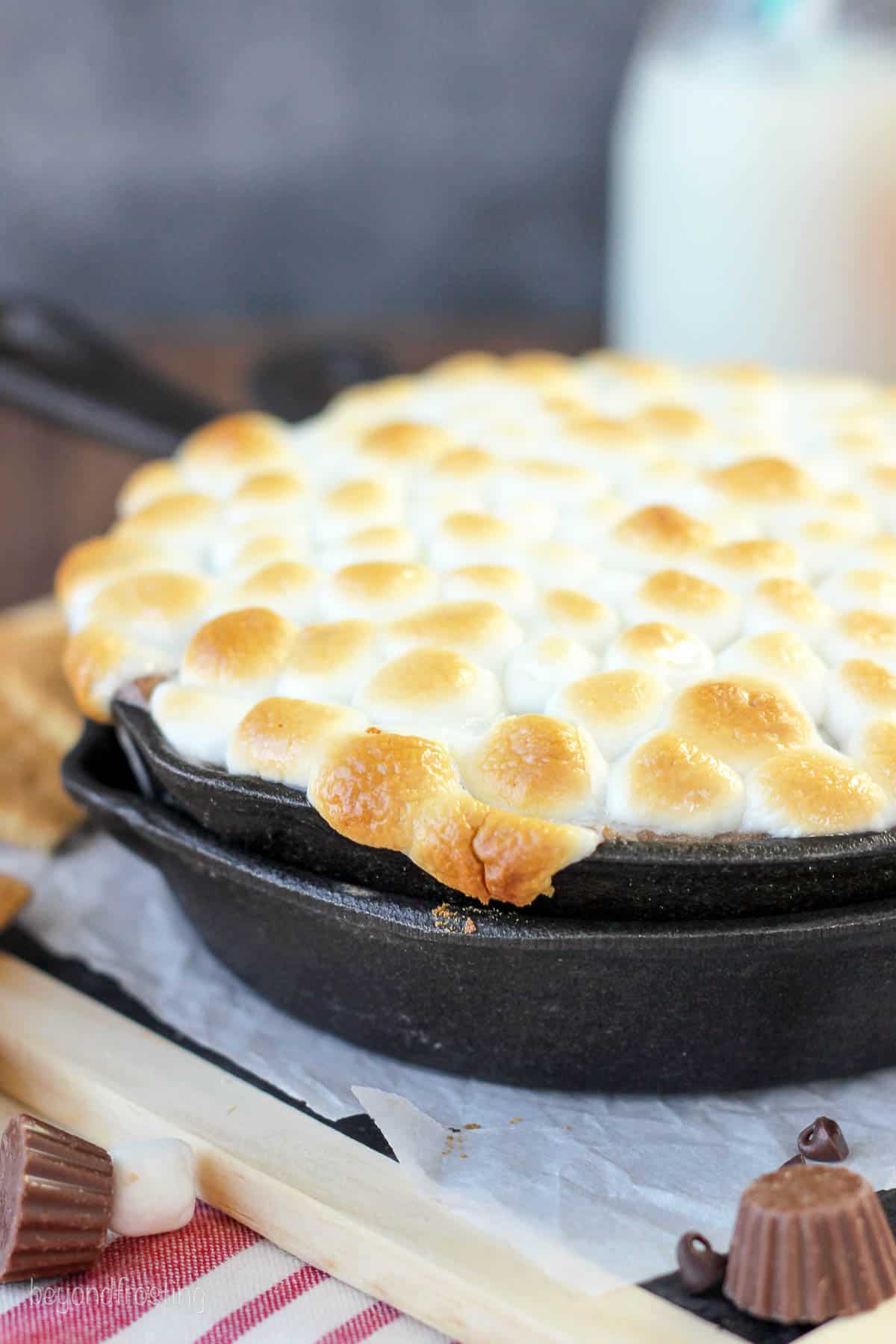 side view of a skillet of s'mores dip