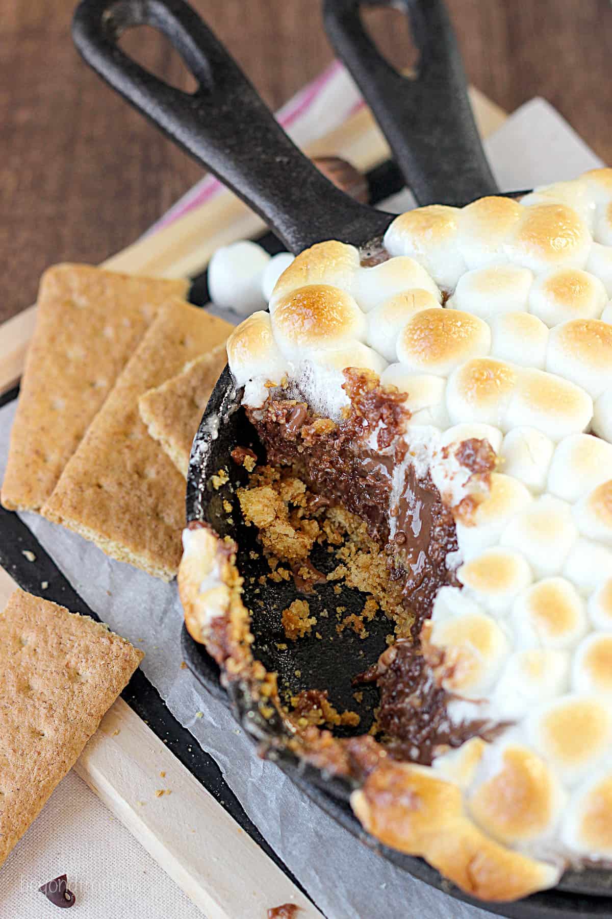 overhead of a partially eaten pan of s'mores dip