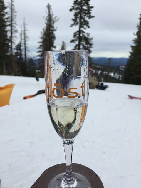 Close-up of a glass of Tost champagne