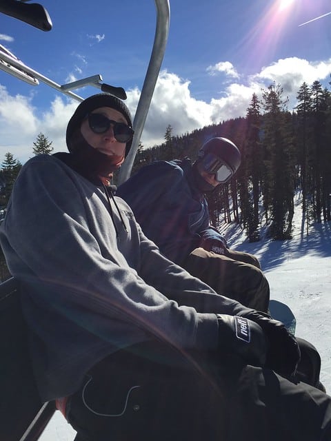 Selfie of two people on a ski lift