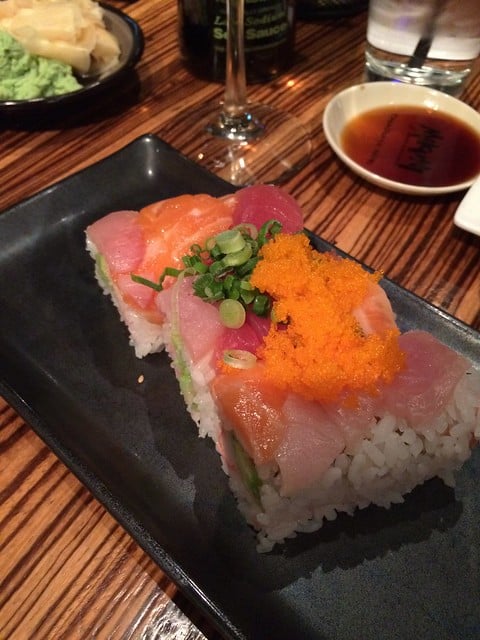 Sushi on a plate at a restaurant