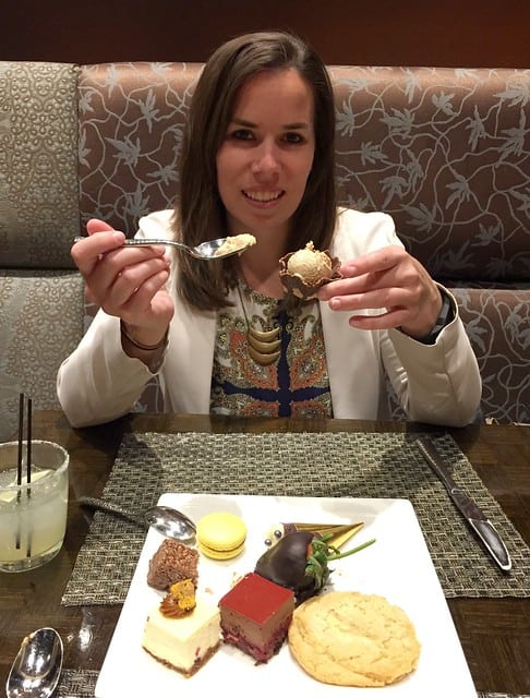 Author with a plate of desserts from the dessert bar