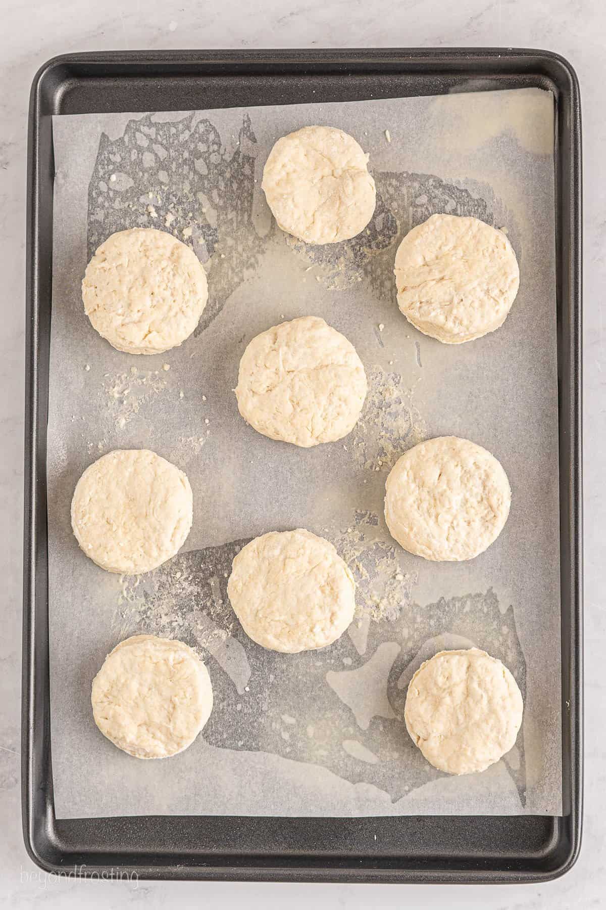 Overhead view of biscuits on a baking sheet