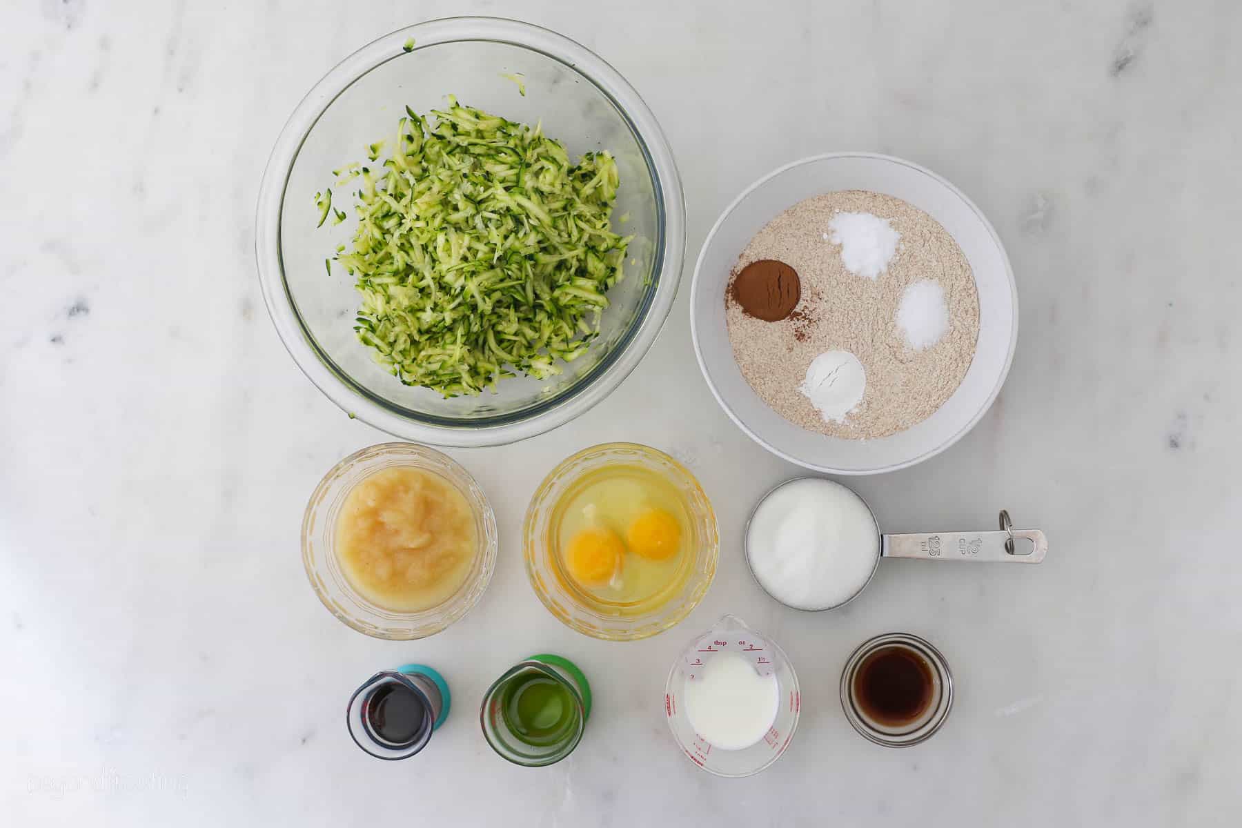 ingredients for healthy banana bread in small dishes
