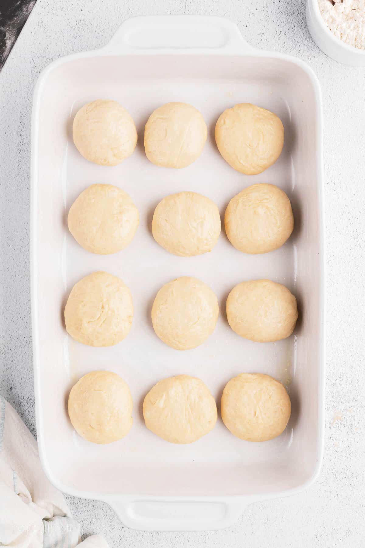 Balls of dough in a baking dish