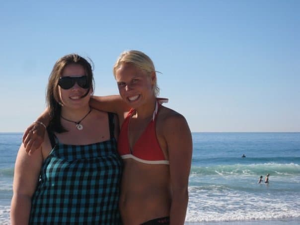 Author with her sister at the beach before weight loss