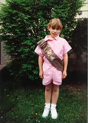 Author as a young girl with a Girl Scouts sash