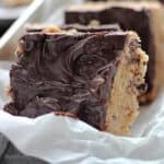 closeup of the top of a rice krispie treat slathered with chocolate ganache