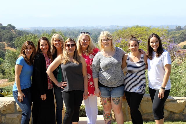 Food bloggers posing at a scenic vista in Santa Barbara