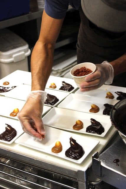 Plates of deconstructed truffles being prepared