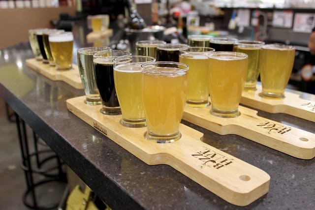 Flights of mead on wooden boards at Buzz Hive