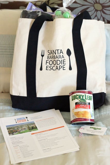 Santa Barbara Foodie Escape tote bag with a magazine in front