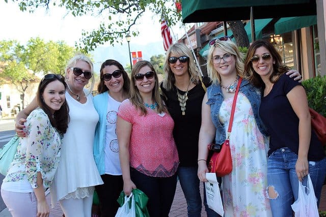 A group of food bloggers posing outside a restaurant in Santa Barbara