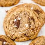 closeup of a brown butter chocolate chip cookie leaning on another