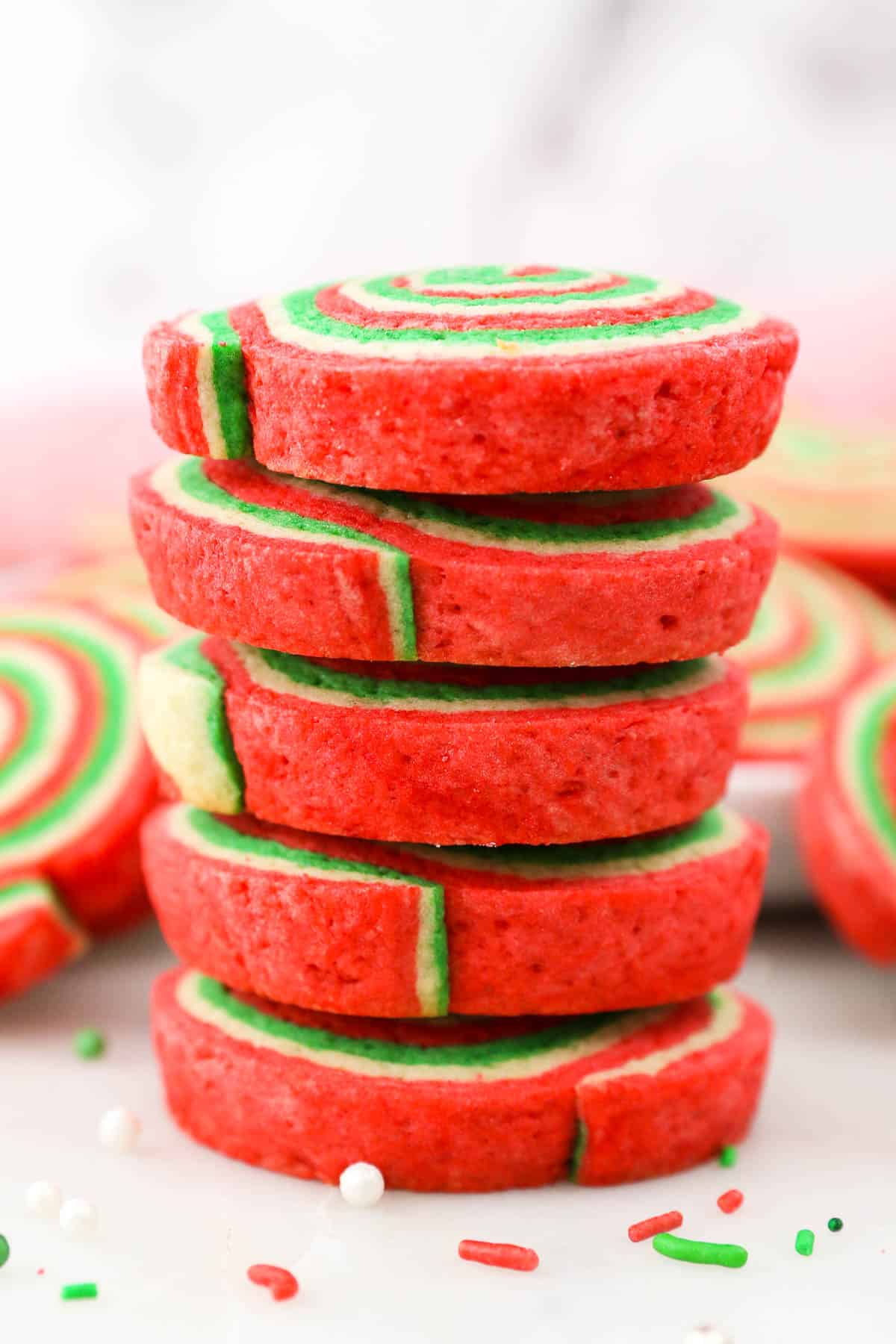 A stack of Christmas pinwheel cookies.