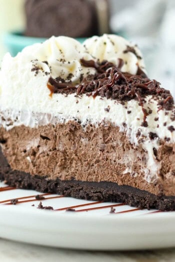 side view of a slice of chocolate marshmallow pie with Oreo crust