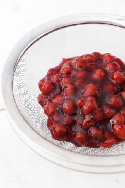 a bowl filled with cherry pie filling