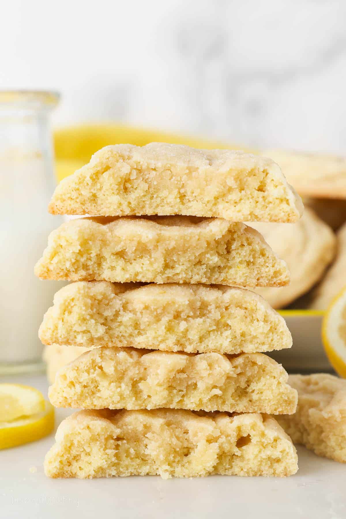 A stack of lemon sugar cookie halves.