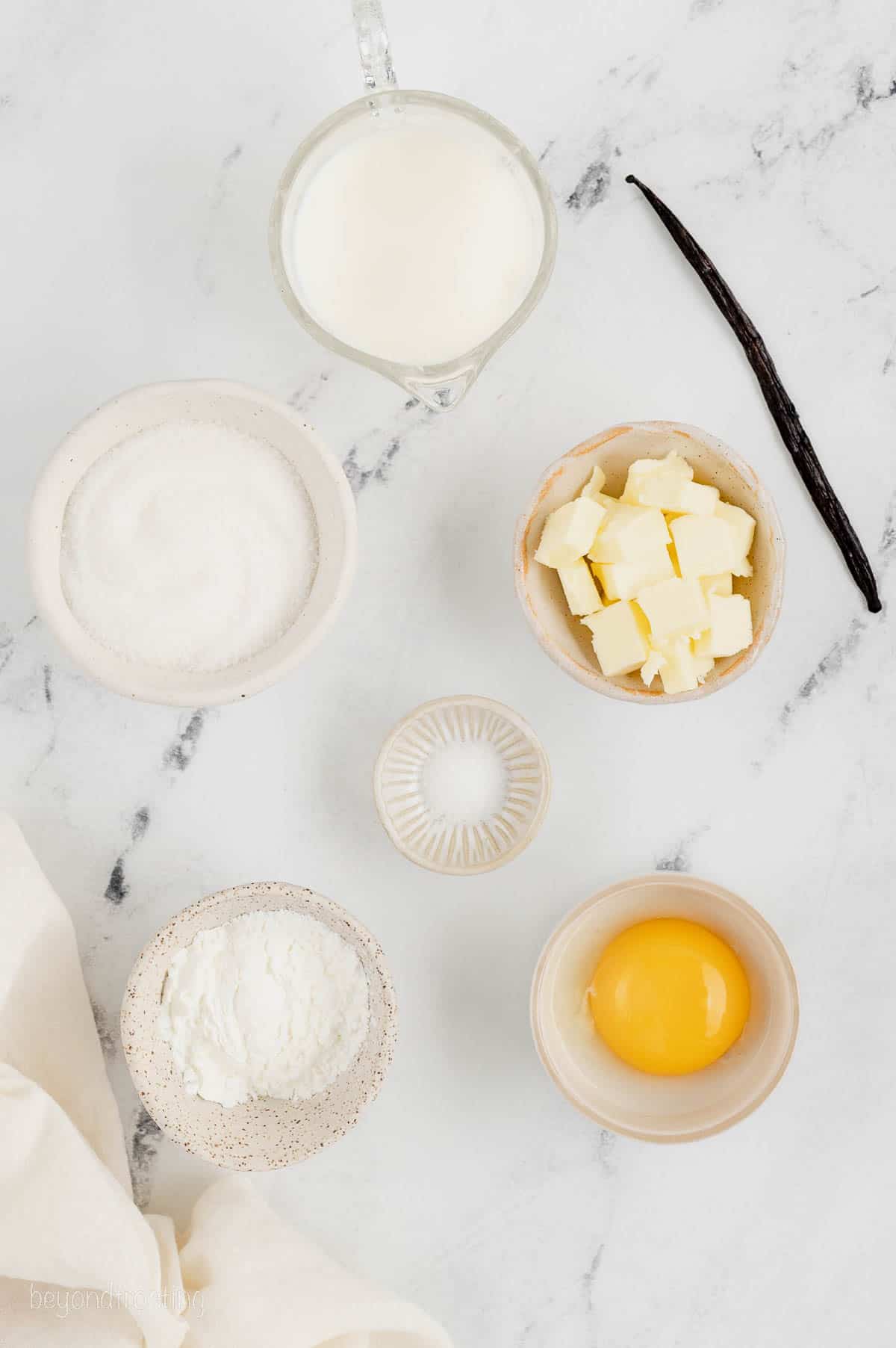 The ingredients for homemade vanilla pastry cream.