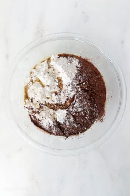 Flour and cocoa powder in a glass mixnig bowl