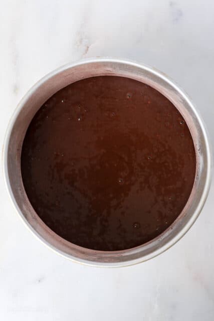 chocolate cake batter in an 8-inch pan