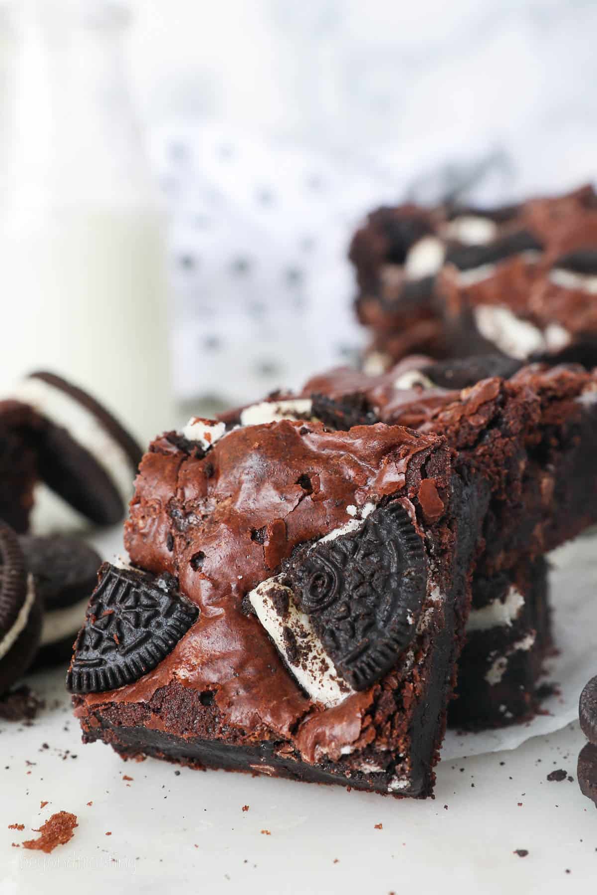 Close up of an Oreo brownie topped with chopped Oreos.