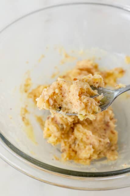 Browned butter remixed in a glass bowl to redistribute the milk solids.