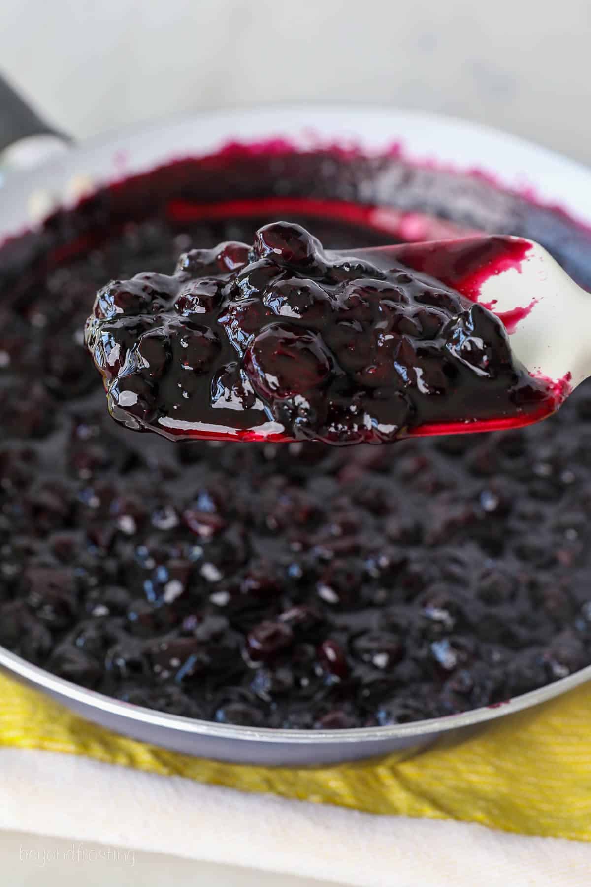 a spatula full of blueberry filling