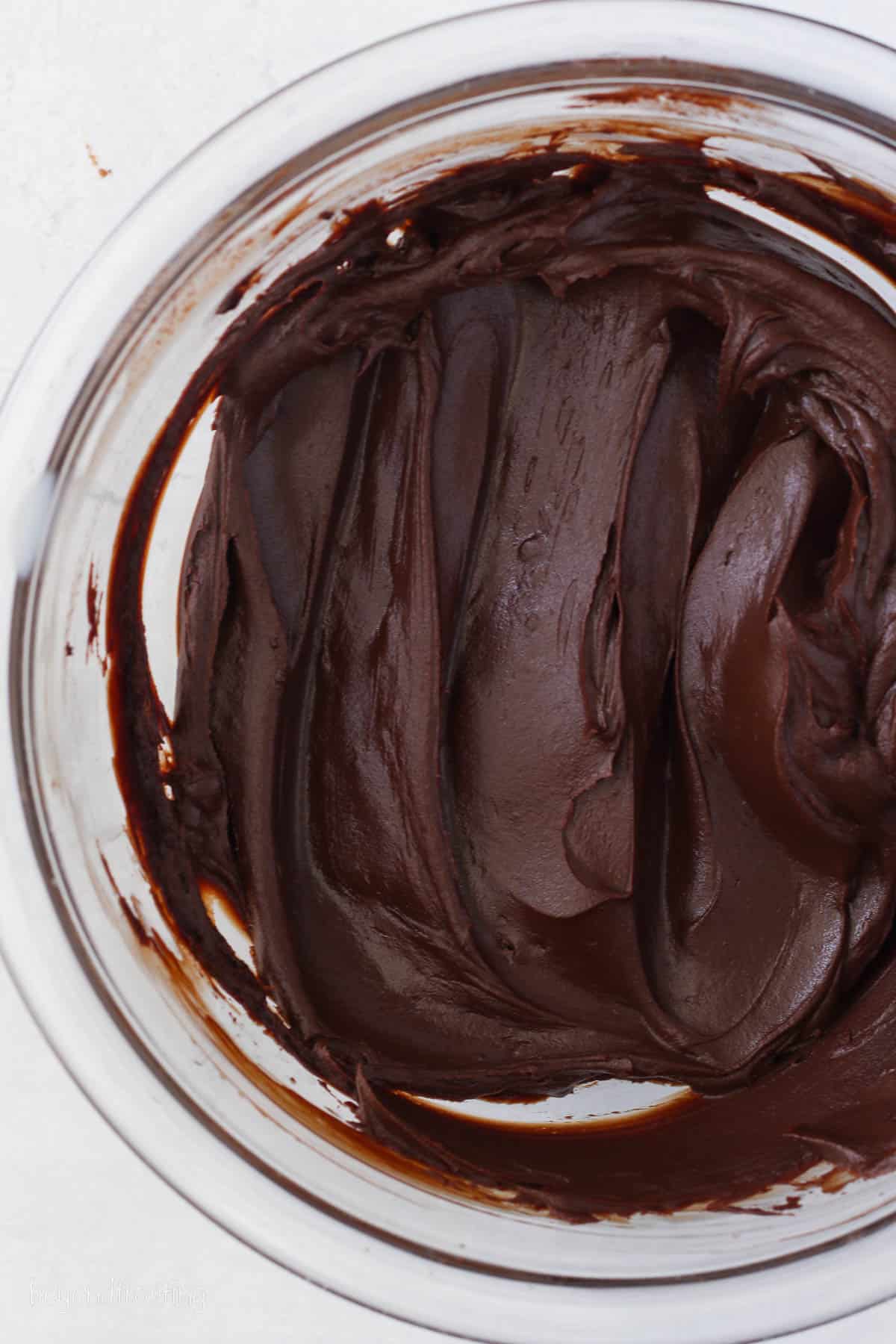 Chocolate ganache in a mixing bowl.