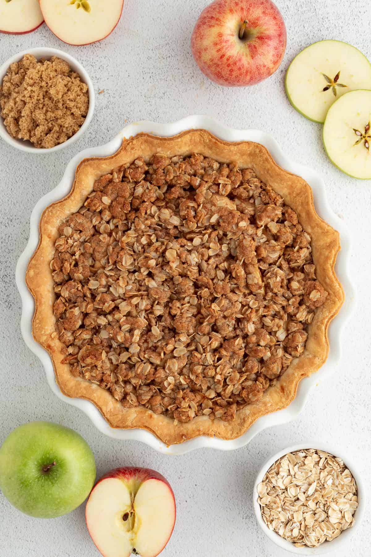 Overhead view of a baked apple crumble pie.
