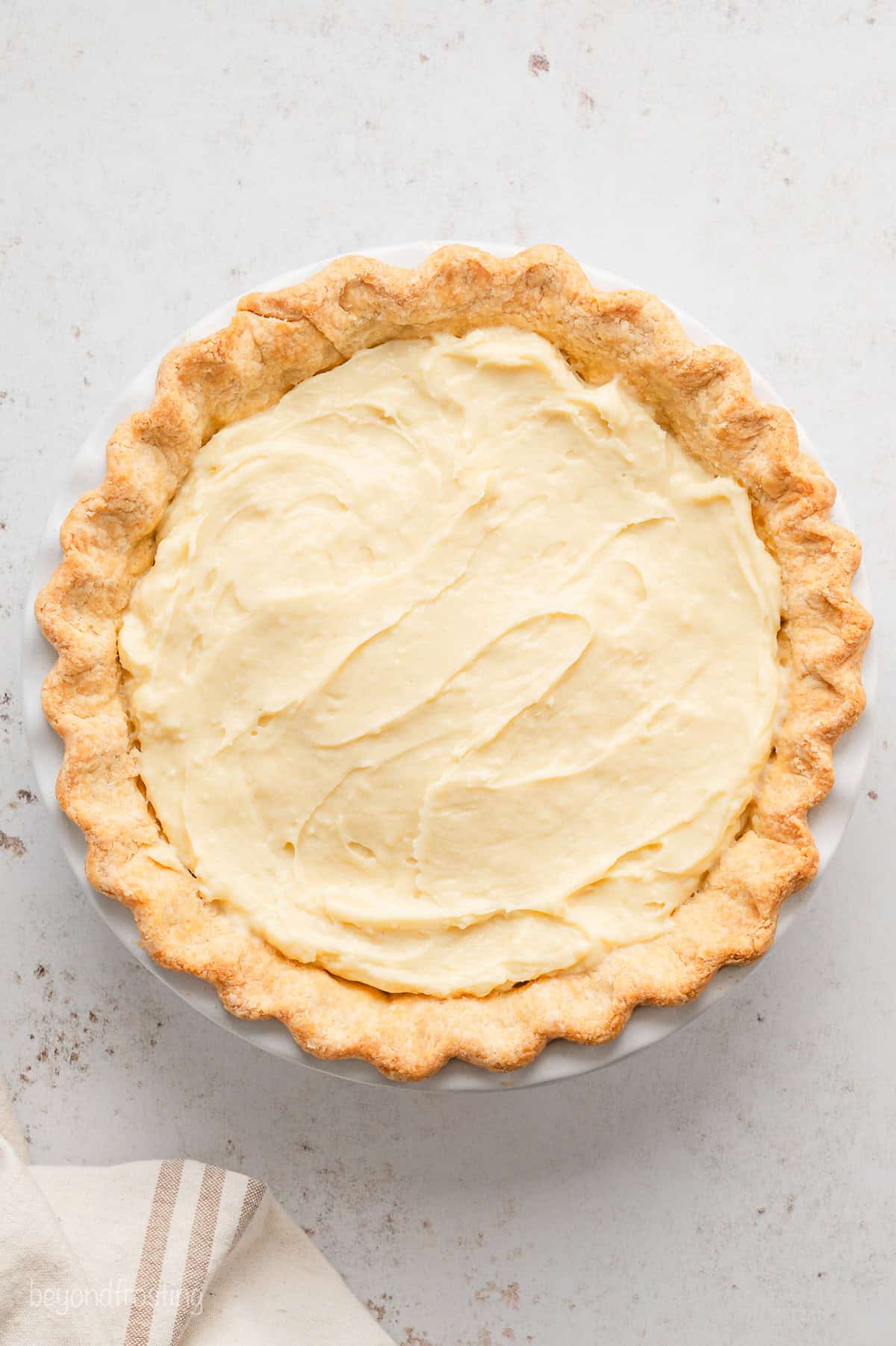 Assembled banana cream pie in a pie crust.