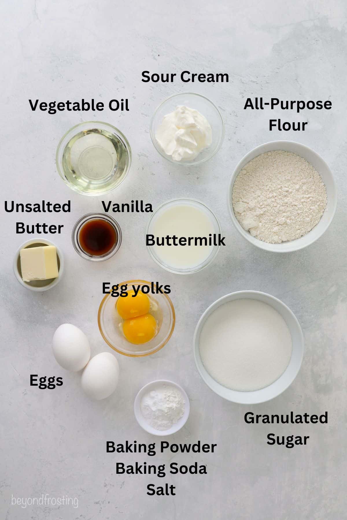 Ingredients for homemade yellow sheet cake in white and clear bowls with text overlay