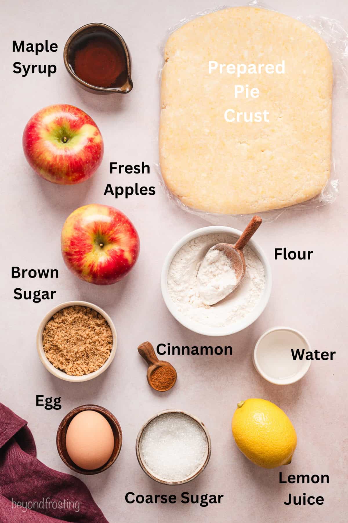 Ingredients for apple hand pies with text labels overlaying each ingredient.