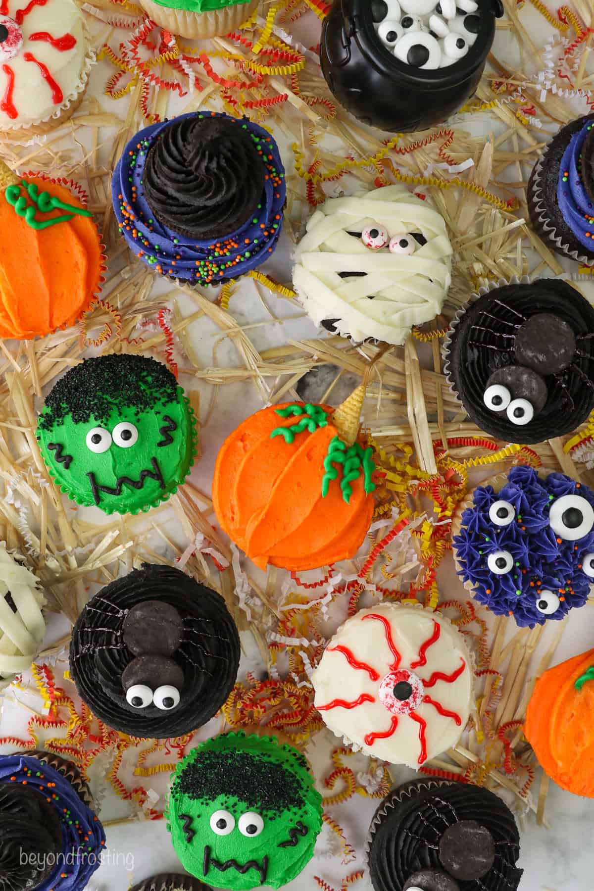 An overhead shot of halloween cupcakes