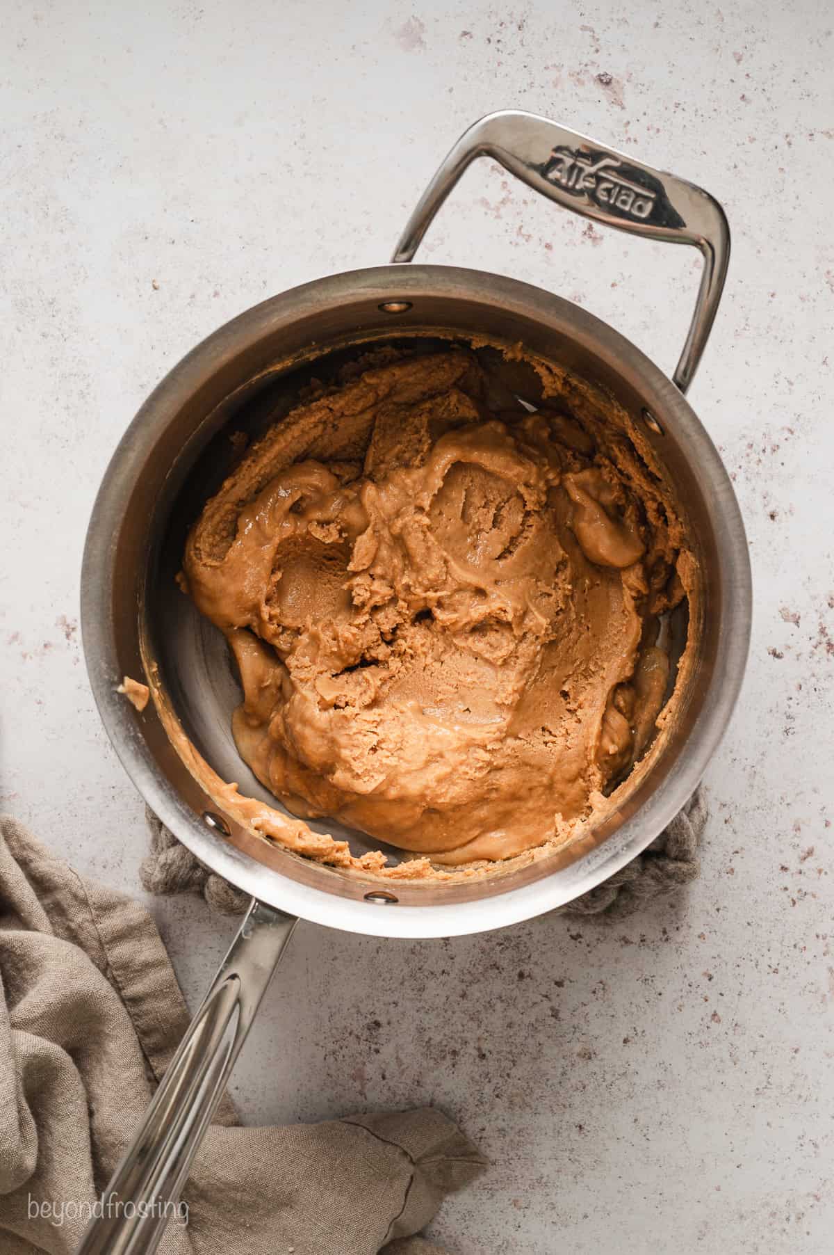 Peanut butter fudge mixture in a saucepan.