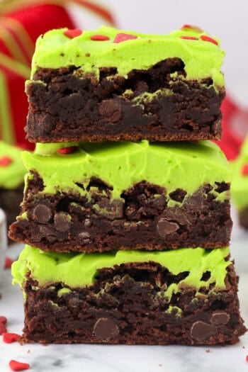 Side view of three Grinch brownies stacked on top of one another.