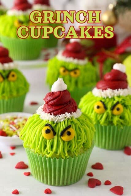 Pinterest title image for Grinch Cupcakes.