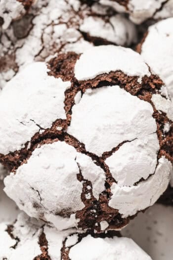 Close up of assorted chocolate crinkle cookies.