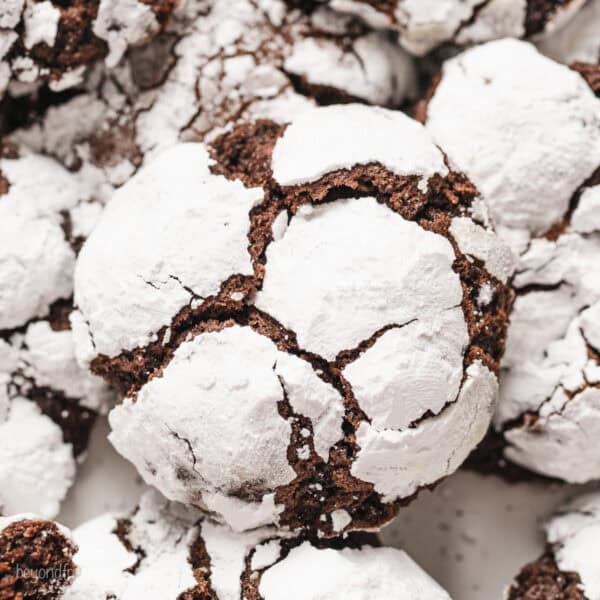 Close up of assorted chocolate crinkle cookies.