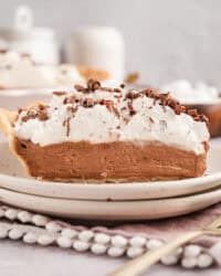 A slice of French silk pie on a plate.