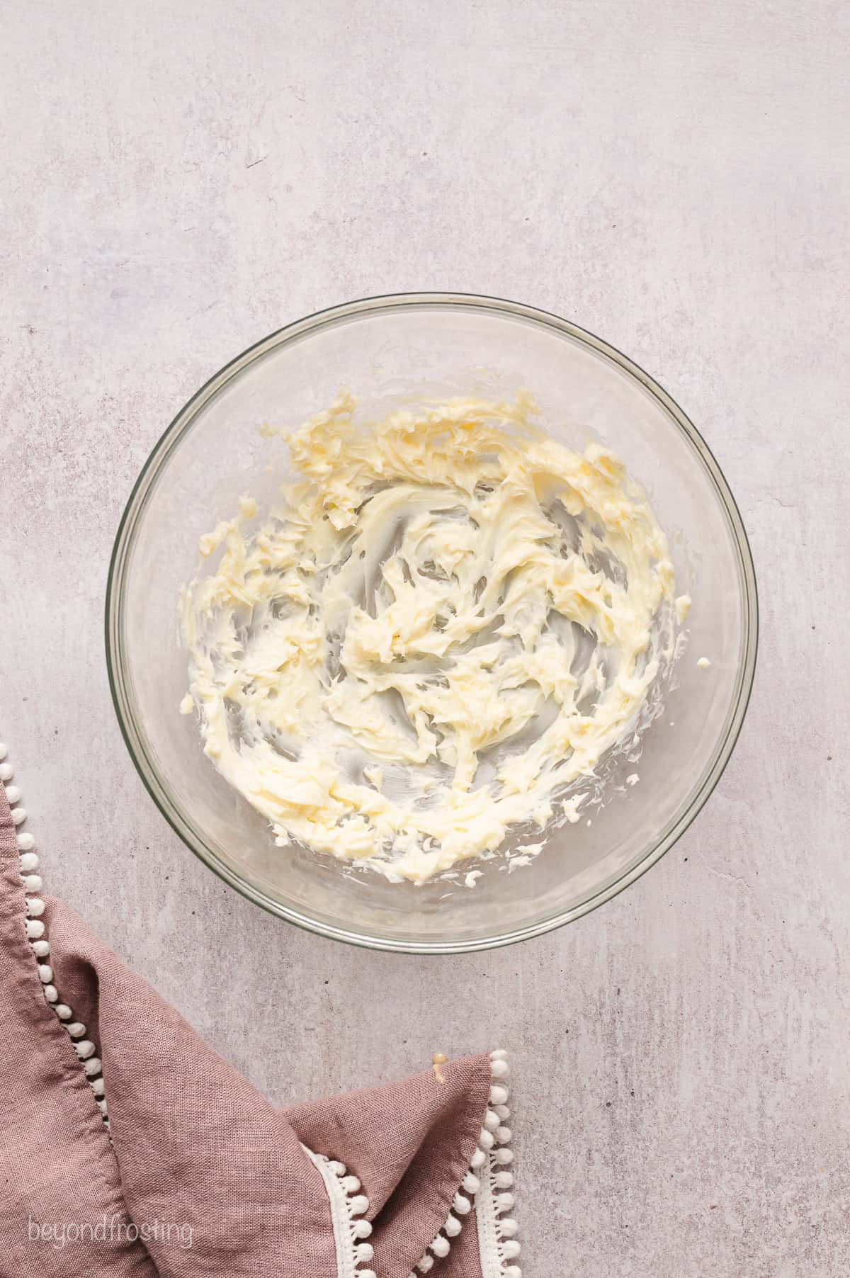 Whipped butter in a glass bowl.