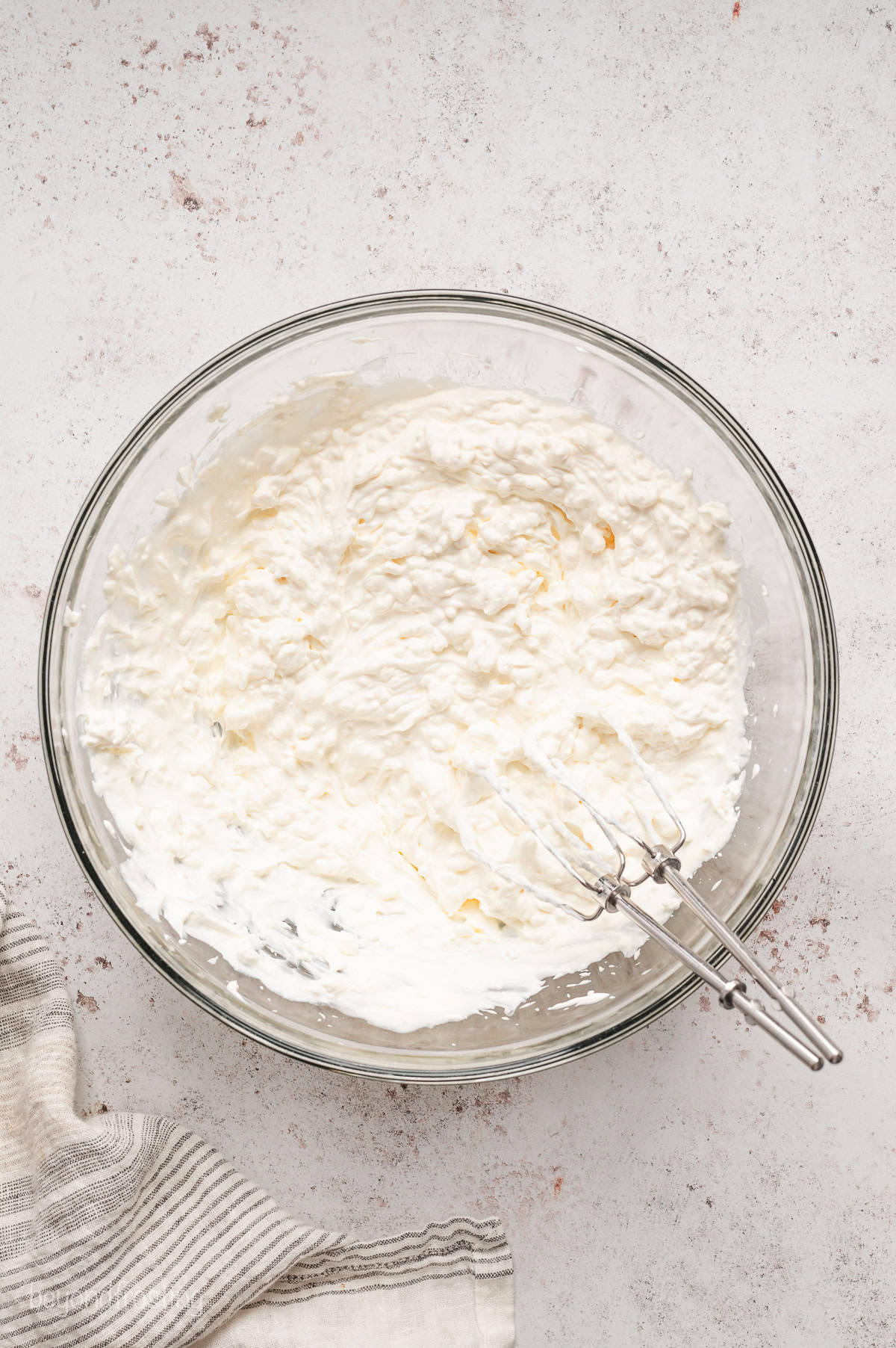 The creamy dip base combined in a glass bowl.