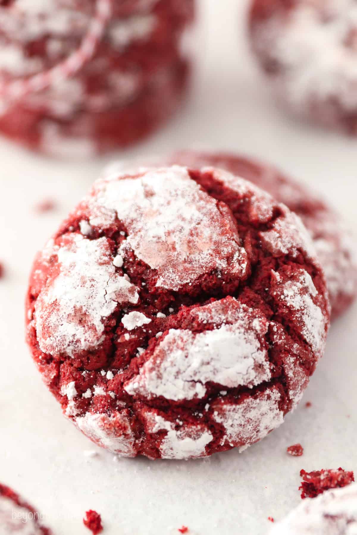 Overhead close up view of a red velvet cake mix cookie.