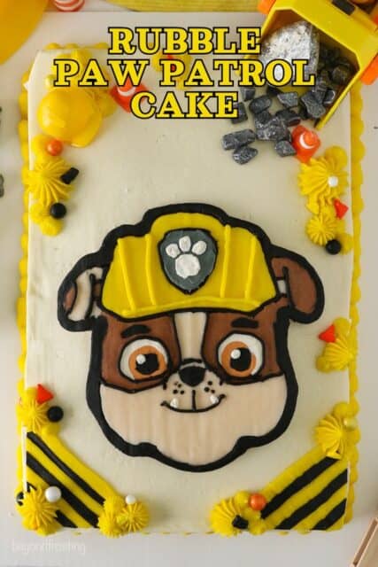 Pinterest title image for Rubble Paw Patrol Cake.