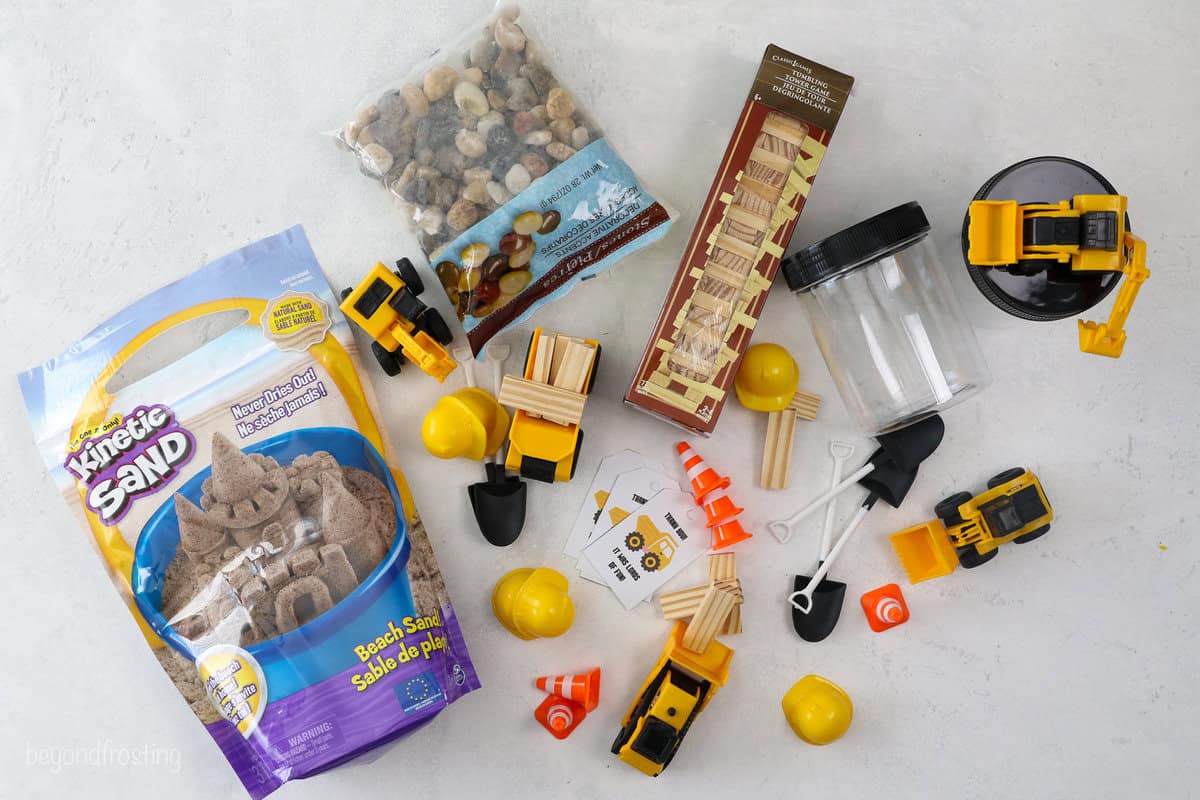 Overhead view of construction birthday party supplies.