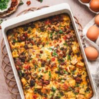 Overhead view of a breakfast egg casserole in a baking dish.