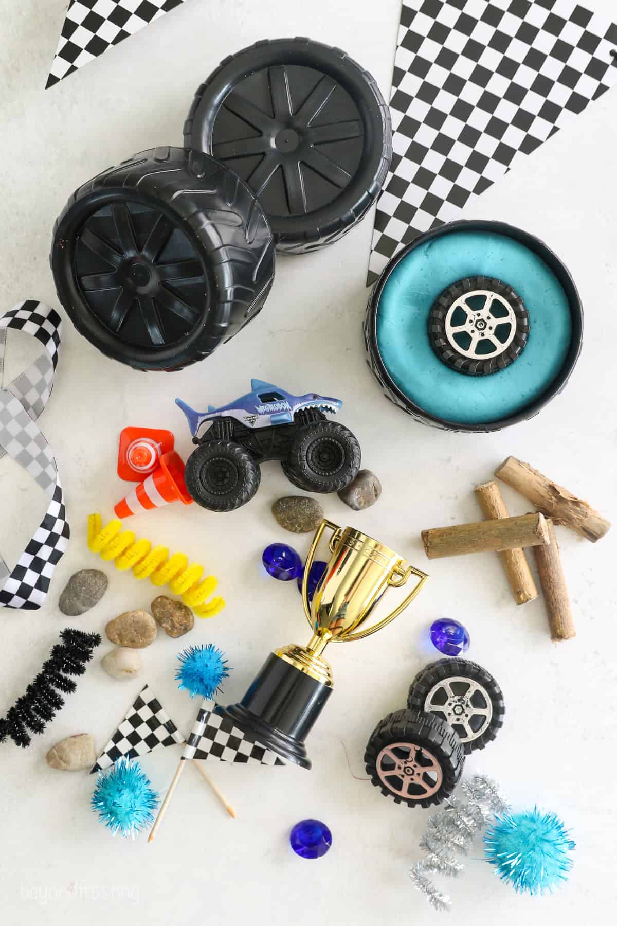 Overhead view of Monster Jam play dough kit contents for a Megalodon themed kit.