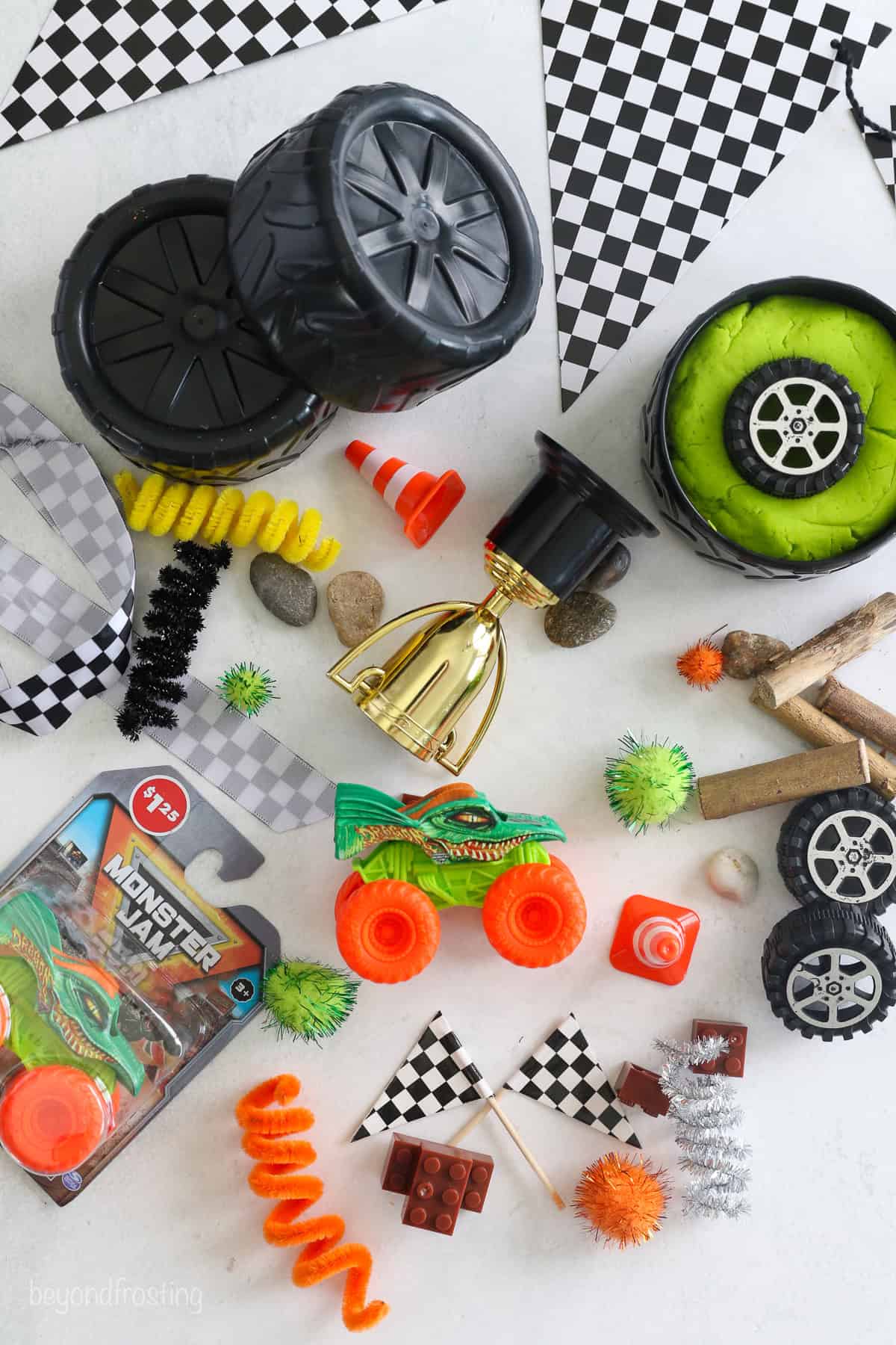 Overhead view of Monster Jam play dough kit contents for a Dragon themed kit.