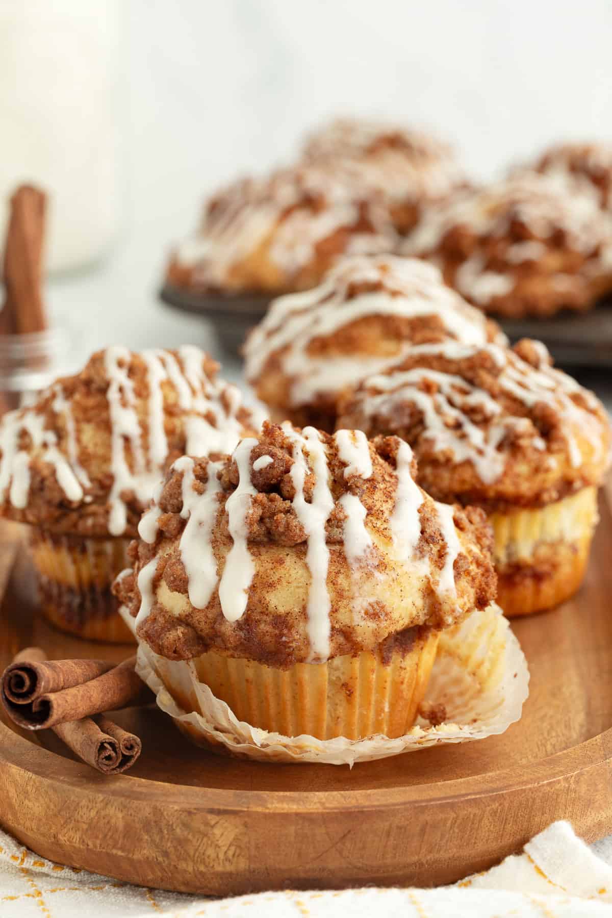 Coffee cake muffins topped with glaze.